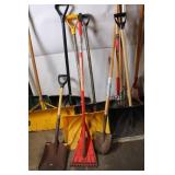 Collection of Assorted Snow Shovels, Spades, and Garden Tools