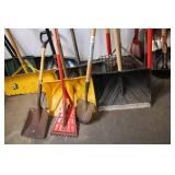 Collection of Assorted Snow Shovels, Spades, and Garden Tools