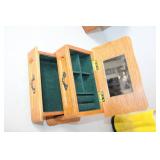 Collection of Home Decor Items Including Jewelry Box, Photo Frames, and Mini Boot Vase