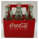 1923 Coca-Cola Plastic Carrier With 1993 Season Greetings Bottles