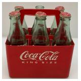1923 Coca-Cola Plastic Carrier With 1993 Season Greetings Bottles