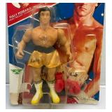 Est. $200.00 - $300.00 1983 PAC Phoenix Toys ROCKY Sylvester Stalllone As Rocky Fully poseable Doll On Original Card (New Old Stock) Missing Belt  Packaging Shows Wear