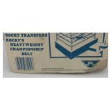 Est. $200.00 - $300.00 1983 PAC Phoenix Toys ROCKY Sylvester Stalllone As Rocky Fully poseable Doll On Original Card (New Old Stock) Missing Belt  Packaging Shows Wear