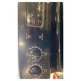 GE Black Electric Range with 4 Burners and Oven