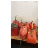 Collection of 8 Plastic and Metal Gasoline Fuel Cans