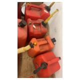 Collection of 8 Plastic and Metal Gasoline Fuel Cans