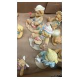 Collection of 14 Bear Figurines with Various Designs