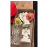 Assorted Holiday Decorations Including Figurines and Plush Toys