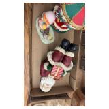 Assorted Holiday Decorations Including Figurines and Plush Toys
