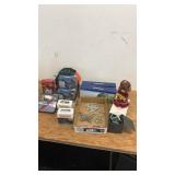 Assorted LED Light Sets, Collectible Doll, and Metal Wall Decorations