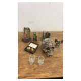 Collection of Dragon and Skull Themed Figurines and Decor