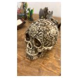 Collection of Dragon and Skull Themed Figurines and Decor