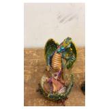 Collection of Dragon and Skull Themed Figurines and Decor