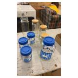 Collection of 8 Glass Storage Jars with Wooden and Blue Lids