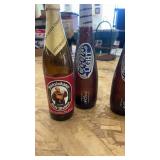 Collection of Glass Bottles, Animal-Themed Lamp, and Decorative Glassware