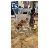 Collection of Glass Bottles, Animal-Themed Lamp, and Decorative Glassware