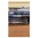 Collection of DVDs Featuring Music, Comedy, and Films