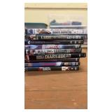 Collection of DVDs Featuring Music, Comedy, and Films