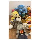 Large Collection of Assorted Plush Toys and Stuffed Animals