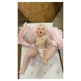 Collection of Porcelain Dolls and Decorative Masks