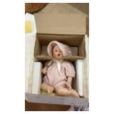 Collection of Porcelain Dolls and Decorative Masks