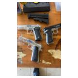 Airsoft Equipment Collection with Pistols, Targets, BBs, and More