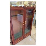 Vintage Wooden Display Cabinet with Antler Accents and Glass Doors