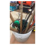 Collection of Assorted Hand Tools Including Shovels, Pickaxes, and More