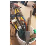 Collection of Assorted Hand Tools Including Shovels, Pickaxes, and More