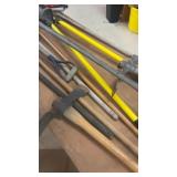 Collection of Assorted Hand Tools Including Shovels, Pickaxes, and More