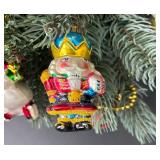 Festive Christopher Radko Faux Christmas Tree Adorned with Christopher Radio Ornaments