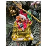 Festive Christopher Radko Faux Christmas Tree Adorned with Christopher Radio Ornaments