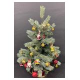 Festive Christopher Radko Faux Christmas Tree Adorned with Christopher Radio Ornaments