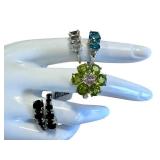 Four Sterling Silver Rings with Beautiful Designs