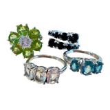 Four Sterling Silver Rings with Beautiful Designs