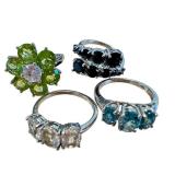 Four Sterling Silver Rings with Beautiful Designs