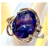 Elegant Silver Ring with Large Gemstone and Accent Stones