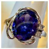Elegant Silver Ring with Large Gemstone and Accent Stones