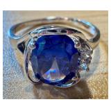 Elegant Silver Ring with Large Gemstone and Accent Stones