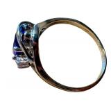 Elegant Silver Ring with Large Gemstone and Accent Stones