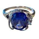 Elegant Silver Ring with Large Gemstone and Accent Stones