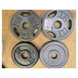 A lot of Four 2.5LB -One -Inch Weight Plates (USED)