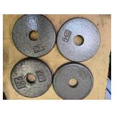 A lot of Four 2.5LB -One -Inch Weight Plates (USED)
