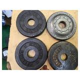 A lot of Four 2.5LB -One -Inch Weight Plates (USED)