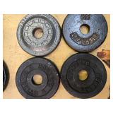 A lot of Four 2.5LB -One -Inch Weight Plates (USED)
