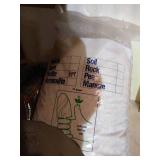 Shelf of Bird Food, Feeder & Peat Rock