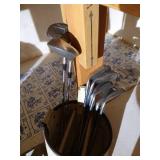 Three Sets of Golf Clubs