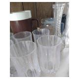 Shelf of Glasses, Vases, Jello Molds, Etc