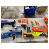TABLE FULL OF NERF & RIVAL GUNS