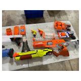 TABLE FULL OF NERF & RIVAL GUNS